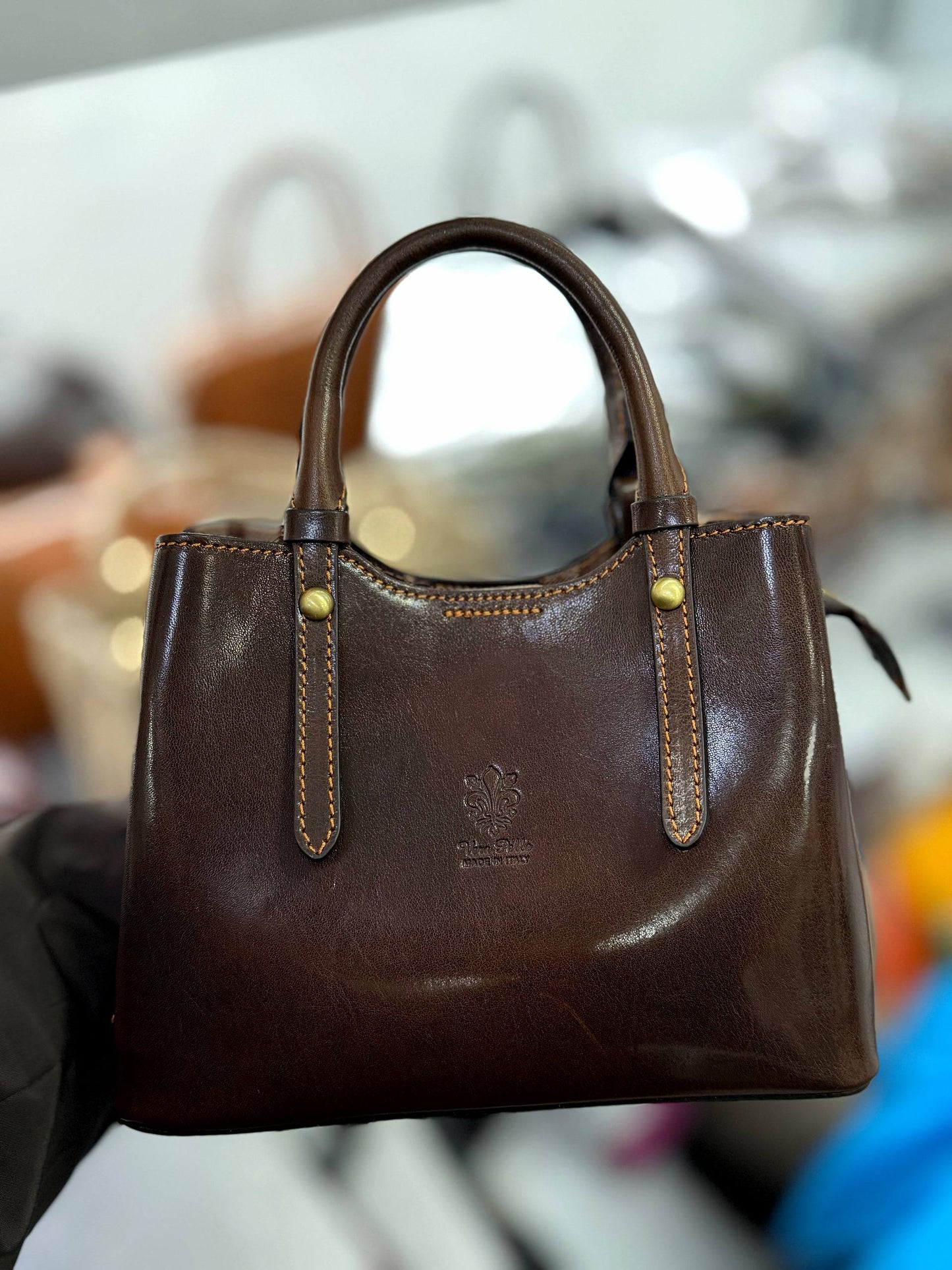 Structured Leather Top Handle Bag with Zip Closure and Shoulder Strap